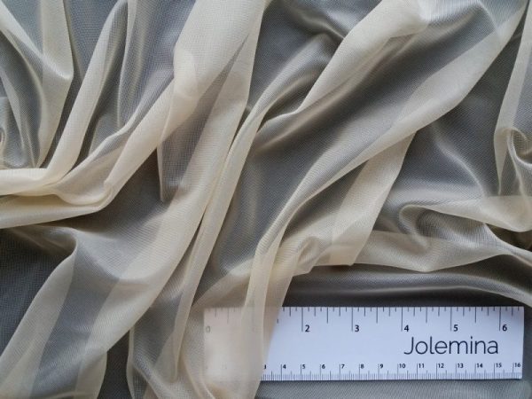 soft sheer beige fabric with ruler