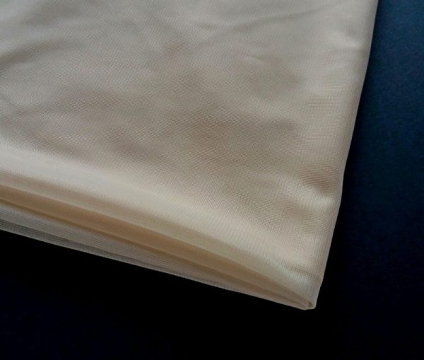 beige nylon fabric folded