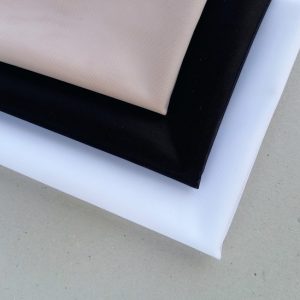 light skin black white non stretch folded fabric pieces