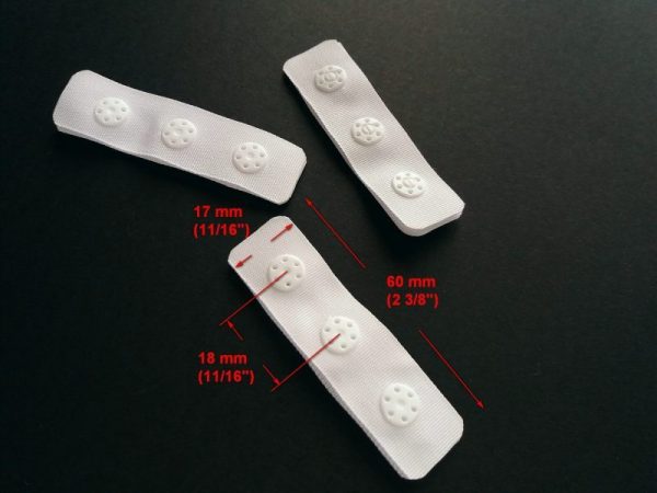 white plastic snap tape with measurements