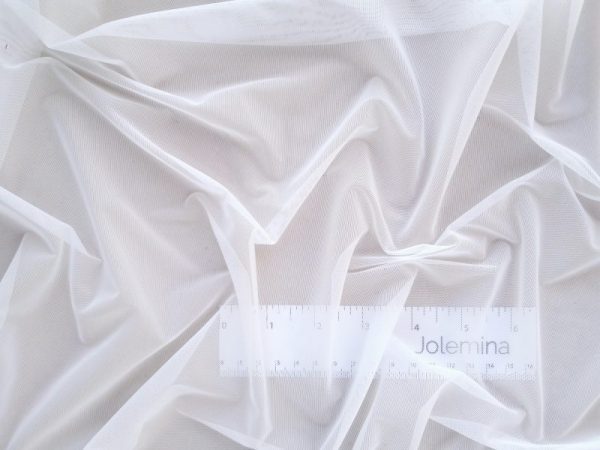 white extra light weight sheer power mesh fabric with ruler