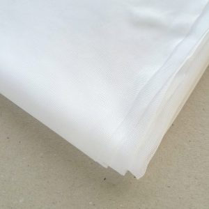 white extra light weight stretch powermesh fabric folded